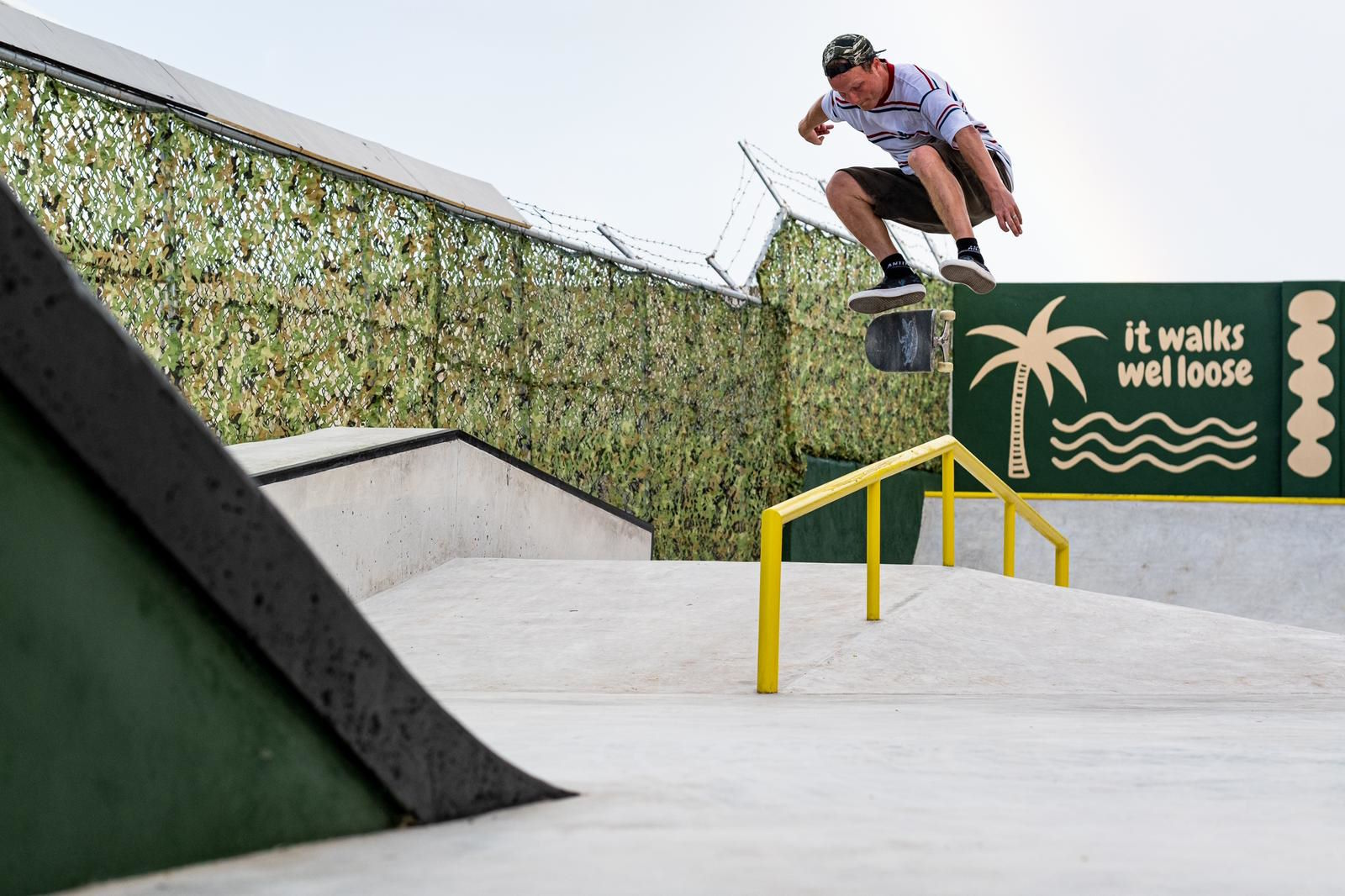 Young skateboarder at skate park outdoor